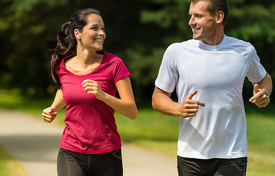 Couple jogging together to get healthy in Allen
