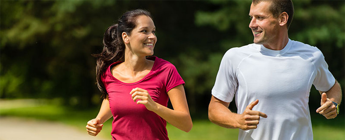 Couple jogging together to get healthy in Allen