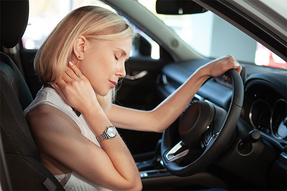 Woman in need of auto accident injury care at Allen Auto Accident Injury Care in Allen after an auto accident resulting in whiplash